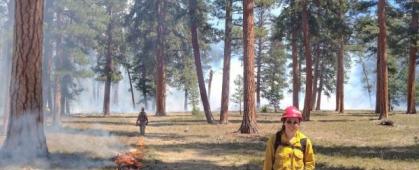 Maggie Epstein working on a prescribed fire