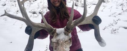 Arica Crootof holds an elk skull